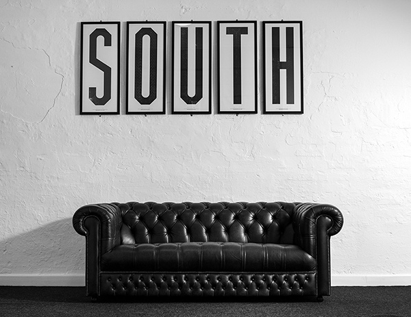 Studio Space Manchester - M ONE - Sofa and Anthony Burrill's SOUTH